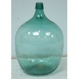 A large green glass carboy garden bottle. 48 cm high.