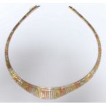 An Italian 9ct gold tri colour fringe necklace, 24.4 grams. In a fitted box.