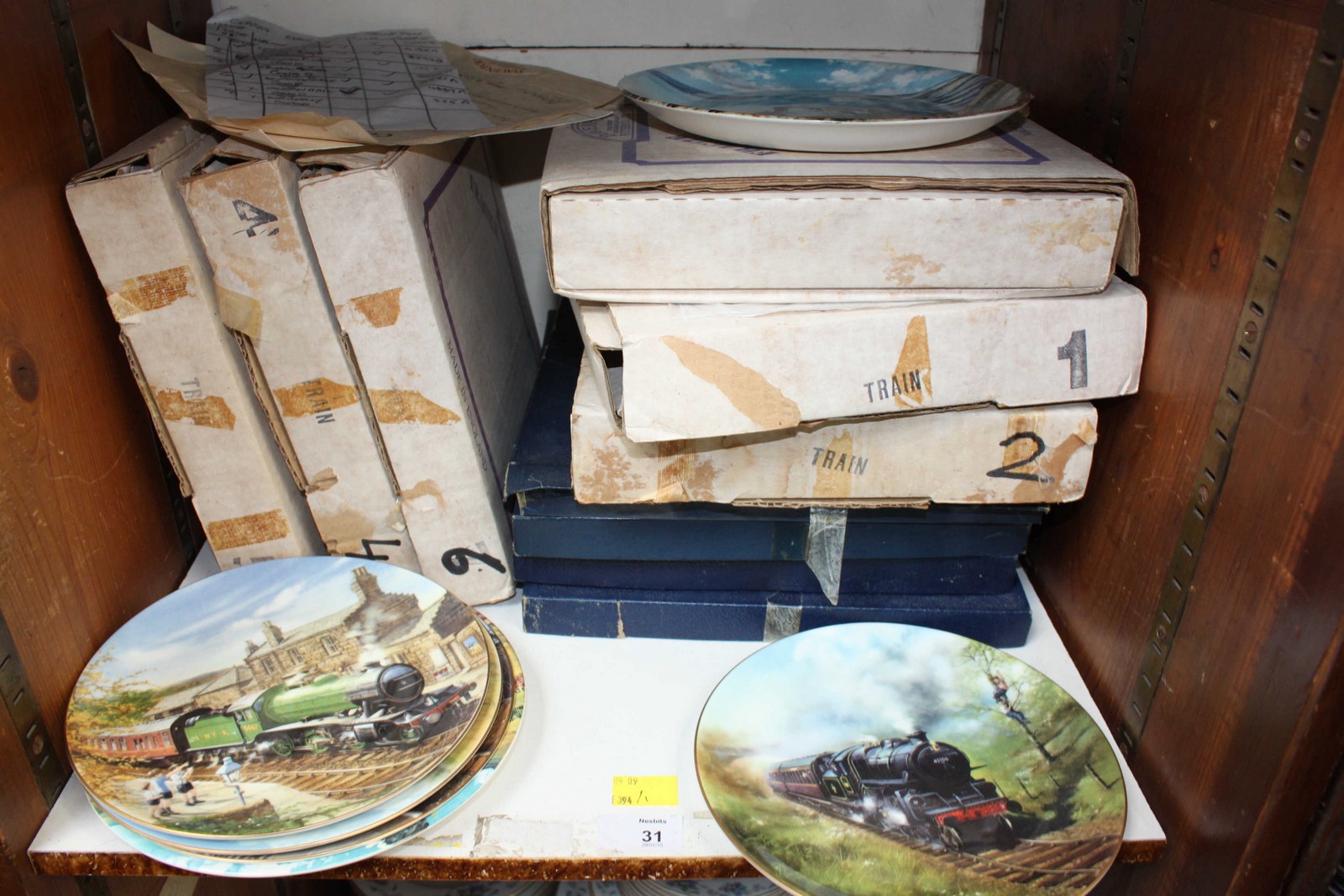 SECTION 31.  A collection of wall plates of steam locomotive interest.