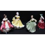 Four Royal Doulton porcelain figures including 'Ninette' HN2379, 'Fair Lady' HN2193, 'Christmas