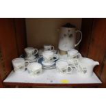 SECTION 25.  A set of six 'Susie Cooper', china coffee cans and saucers in the 'Glen Mist'