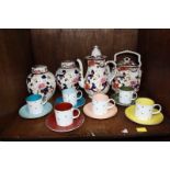 SECTION 34.  Six 'Susie Cooper', china coffee cans and saucers decorated with stars, together with