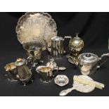 A box of silver plated items including a four piece tea set, egg coddler, salver and other items.