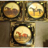 A set of three reproduction framed horse racing pictures, a set of framed hunting cards and a