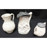 A large Victorian embossed salt glaze jug with pewter lid, together with a salt glazed teapot and