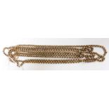 A long 9ct gold guard or muff belcher chain. 31.5 grams.