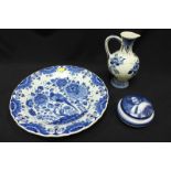SECTION 48.  A large 20th century Delft blue and white charger decorated with a bird of paradise