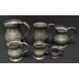 Six Victorian and later graduated pewter tankards, the largest measures 16cm.