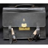 An Elizabeth II good quality black leather document briefcase, with three divisions, brass lock