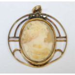 An oval cameo set in an 18ct gold Art Nouveau pendant.