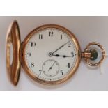A 9ct gold half hunter pocket watch with white enamel dial and Arabic numerals with subsidiary