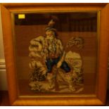 Two 19th century woolwork embroidered pictures of a huntsman, one with dogs, in birds eye maple