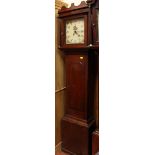 An 18th century oak 30 hour long case clock, with square painted dial, decorated with a ship, the