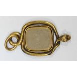 An 18ct gold swivel fob seal in curled snake mount, total approx weight 22.7 grams.
