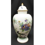 A large 20th century Meissen porcelain vase and cover, decorated with a scene of a bird of