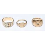 Three 9ct gold rings, including a buckle ring, a signet ring and a larger signet ring set with small