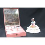 A Royal Doulton porcelain figure 'Day Dreams' HN1731, together with a pink painted metal