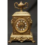 A 19th century cast-brass mantel clock, with eight-day movement striking a bell, the dial with