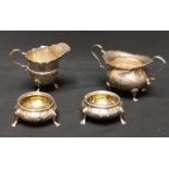 A pair of Victorian silver salts, together with a Victorian cream jug and sucrier. Total 8.1 oz.