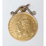 An 1868 Italian 20 Lire 21.6ct gold coin, with soldered suspension loop. 7 grams.