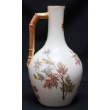 A large Victorian Royal Worcester bottle vase, painted with flowers on a plain cream ground, dated