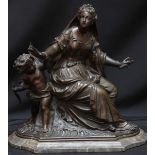 A 19th Century patinated bronze figure group depicting 'Cupid and Venus' on marble base, 30cm.