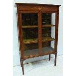 An Edwardian mahogany and satinwood cross-banded two door display cabinet. 89 cm wide, 143 cm high.