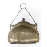 A silver purse with chain, hallmarked 1915, approx gross weight 112.0 grams.