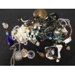 A small collection of items including three silver brooches, a silver mounted cameo, two silver