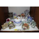 SECTION 22. A collection of ceramics including miniature cottages, posy vases, trinket boxes and