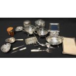 A collection of silver and plated items including two silver photograph frames, three dishes and