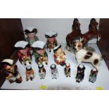 SECTION 4. A collection of Beswick and other Toby jugs, together with two rearing horses and a