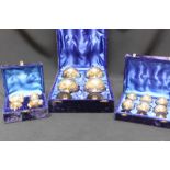 Two boxed sets of Eastern silver plated boxed goblets and a pair of salts, together with a