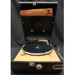 A 1920s Salon Decco portable gramophone.