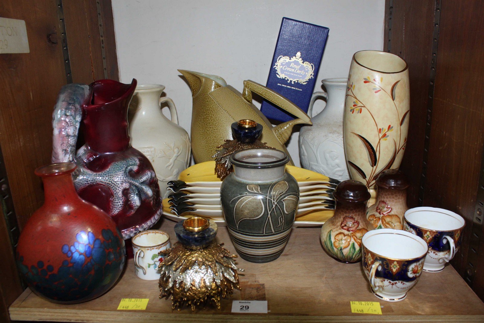 SECTION 29. A collection of assorted ceramics and metal ware including two copies of The Portland