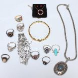 A collection of silver and costume jewellery, including a silver gate bracelet.