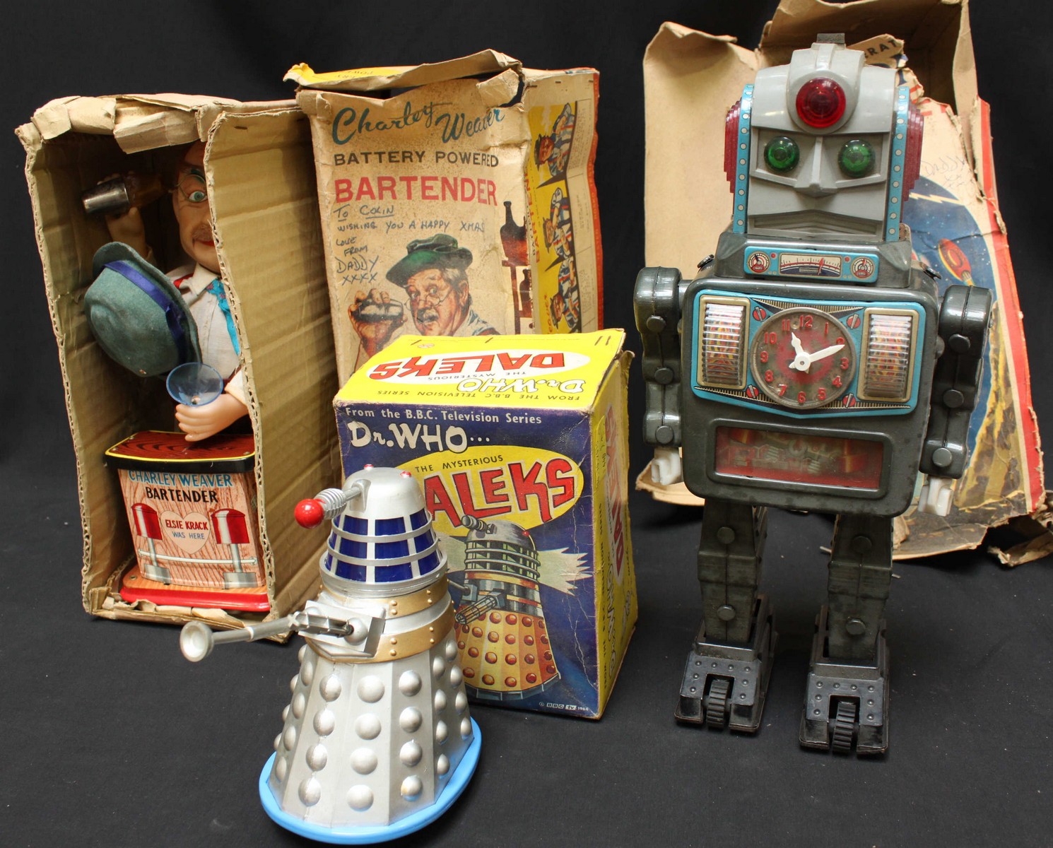 Toys. A Japanese tin plate 'Bartender' in box, together with a 'Moon Explorer' robot in box, and a