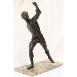 A 19th century cast and patinated bronze figure after the Borghese Gladiator, standing on marble