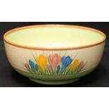 A Clarice Cliff Summer Crocus pattern bowl, painted with crocus' on a plain ground. Marked in gilt