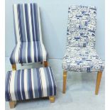 Two modern standard chairs, one upholstered in a continuous blue and white town scene design, the