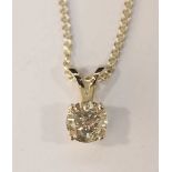 A solitaire diamond necklace pendant, claw-set, round brilliant cut, approximately 0.70-0.75 carats,