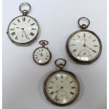 Three late 19th century silver pocket watches and a small silver fob watch. (4)