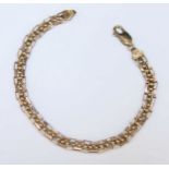 A 9ct gold bracelet, with ball and bar links. 6.7 grams.