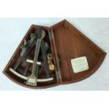 A 19th century ebonised and brass Octant instrument by Dobbie of Glasgow, with ivory scales and