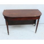 A Georgian mahogany half D end dining table, with single drop leaf, plain top with reeded edges,