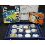 A collection of assorted Australian, European and other silver and nickel proof coins in a coin