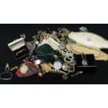 A quantity of costume jewellery including beaded necklaces, metal chains, cufflinks and various