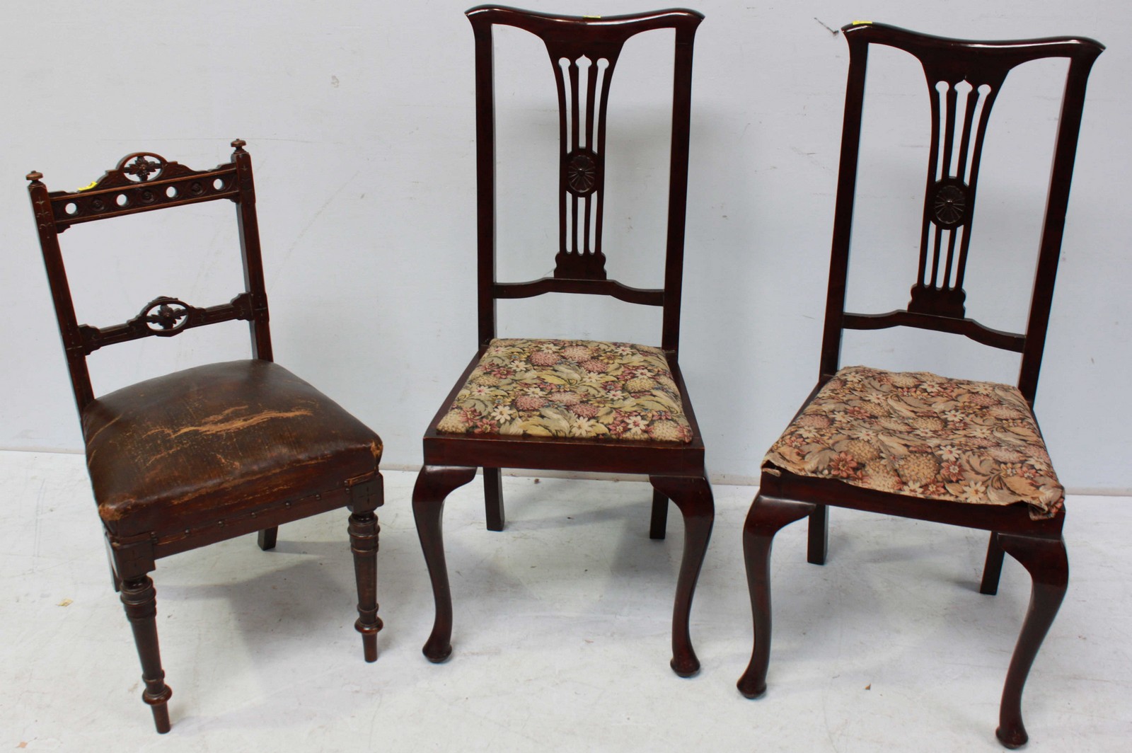 A pair of Edwardian stained-wood standard chairs together with an  Edwardian parlour chair (3)