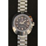 A ladies Rado stainless steel wrist watch, with faceted glass lens, baton numerals and stainless