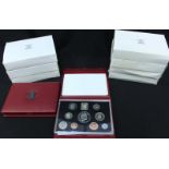 A collection of nine Royal Mint British coin proof sets in original boxes.